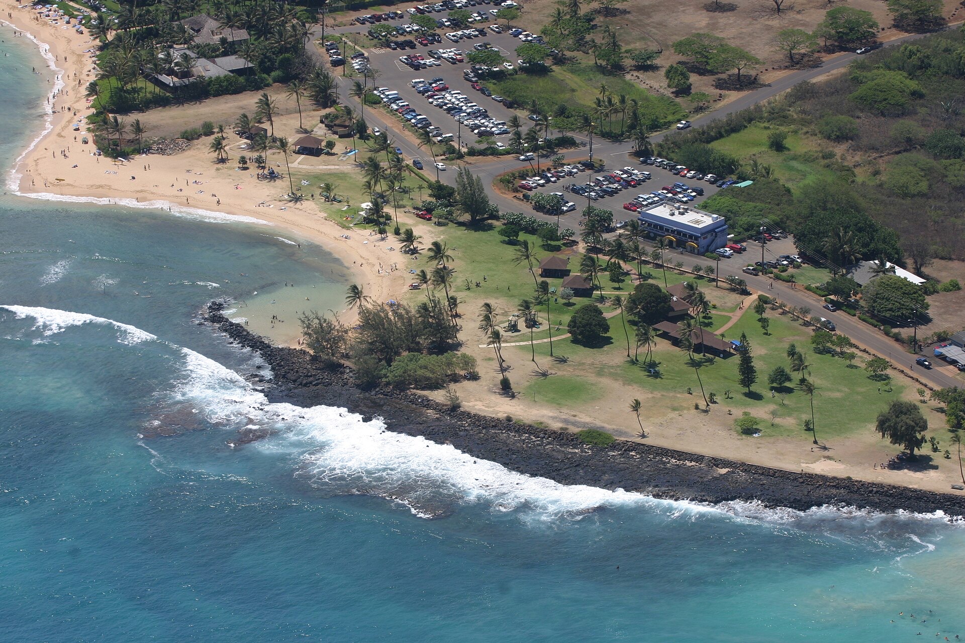 Aerial view of Poipu Beach Park on the south shore of Kauai with its sheltered reef